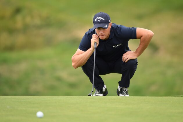 CRANS-MONTANA, SWITZERLAND - SEPTEMBER 04:  Alex Noren of Sweden lines up a putt on the seventh green during the final round of the Omega European Masters at Crans-sur-Sierre Golf Club on September 4, 2016 in Crans-Montana, Switzerland.  (Photo by Ross Kinnaird/Getty Images)