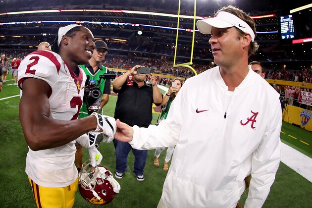 ARLINGTON, TX - SEPTEMBER 03:  Offensive coordinator Lane Kiffin of the Alabama Crimson Tide talks with Adoree' Jackson #2 of the USC Trojans after the Alabama Crimson Tide beat the USC Trojans 52-6 in the AdvoCare Classic at AT&T Stadium on September 3, 2016 in Arlington, Texas.  (Photo by Tom Pennington/Getty Images)