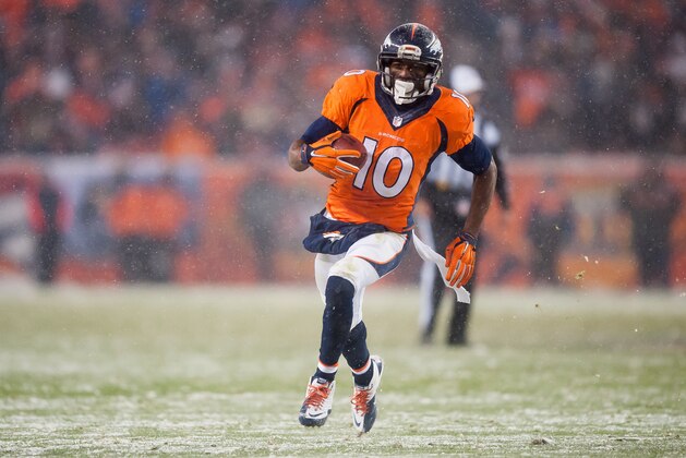 DENVER, CO - NOVEMBER 29: Wide receiver Emmanuel Sanders #10 of the Denver Broncos runs for a first down after a catch against the New England Patriots at Sports Authority Field at Mile High on November 29, 2015 in Denver, Colorado. The Broncos beat the Patriots 30-24 in overtime. (Photo by Dustin Bradford/Getty Images)
