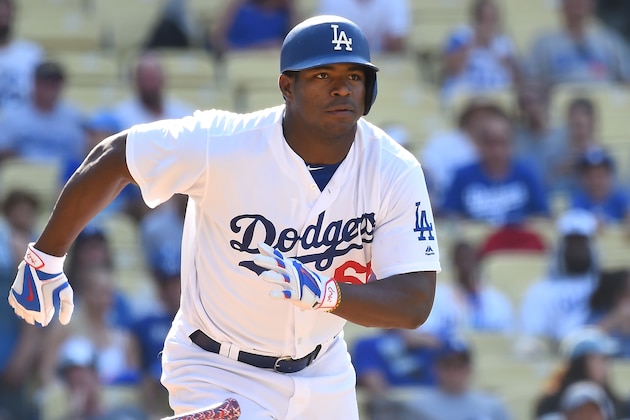LOS ANGELES, CA - JULY 31:  Yasiel Puig #66 of the Los Angeles Dodgers rounds first on a double in the eighth inning of the game against the Arizona Diamondbacks at Dodger Stadium on July 31, 2016 in Los Angeles, California. (Photo by Jayne Kamin-Oncea/Getty Images)