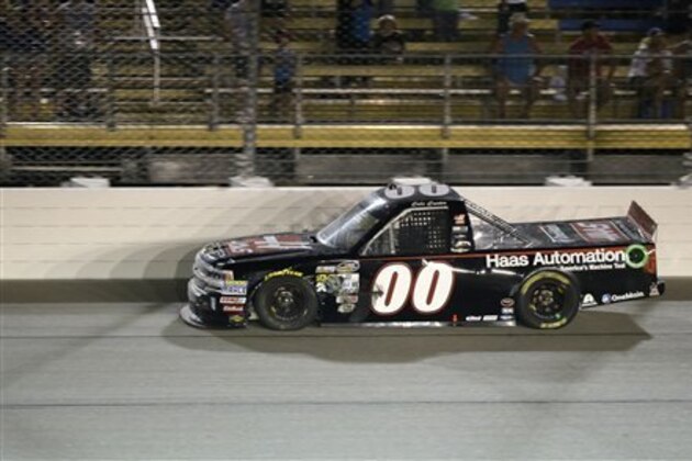Cole Custer (00) races his truck during the NASCAR Truck Series auto race, Saturday, June 18, 2016, at Iowa Speedway in Newton, Iowa. (AP Photo/Charlie Neibergall)