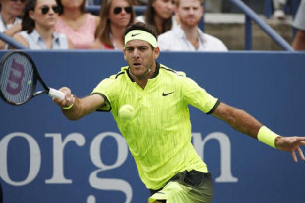 Juan Martin del Potro, of Argentina, returns a shot to David Ferrer, of Spain, during the third round of the U.S. Open tennis tournament, Saturday, Sept. 3, 2016, in New York. (AP Photo/Kathy Willens)