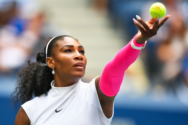 Serena Williams of US serves to Johanna Larsson of Sweden during their 2016 US Open women's singles match at the USTA Billie Jean King National Tennis Center in New York on September 3, 2016. / AFP / EDUARDO MUNOZ ALVAREZ        (Photo credit should read EDUARDO MUNOZ ALVAREZ/AFP/Getty Images)