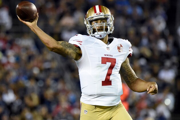 SAN DIEGO, CA - SEPTEMBER 01:  Colin Kaepernick #7 of the San Francisco 49ers makes a pass on the run during a preseason game against the San Diego Chargers at Qualcomm Stadium on September 1, 2016 in San Diego, California.  (Photo by Harry How/Getty Images)