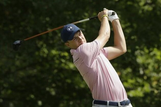 Jordan Spieth watches his tee shot on the fourth hole during the third round of the Deutsche Bank Championship golf tournament Sunday, Sept. 4, 2016, in Norton, Mass. (AP Photo/Steven Senne)