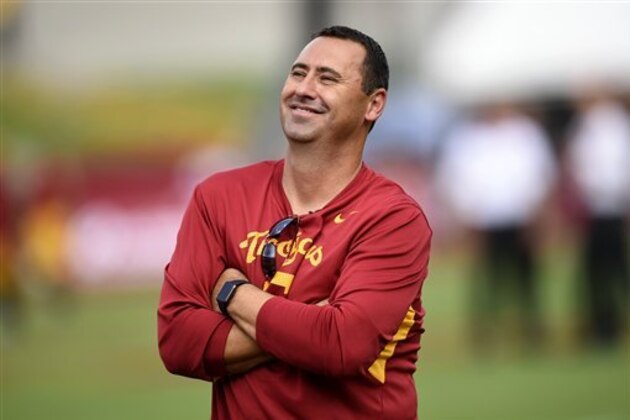 Southern California head coach Steve Sarkisian watch his team warmup before the start of the first half of an NCAA college football game against Idaho, Saturday, Sept. 12, 2015, in Los Angeles. (AP Photo/Gus Ruelas)