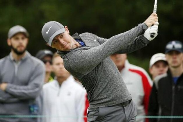 Rory McIlroy, of Northern Ireland, tees off on the third hole during the final round of the Deutsche Bank Championship golf tournament in Norton, Mass., Monday, Sept. 5, 2016. (AP Photo/Michael Dwyer)