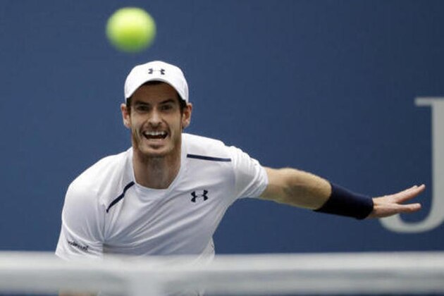 Andy Murray, of the United Kingdom, returns a shot to Paolo Lorenzi, of Italy, during the third round of the U.S. Open tennis tournament, Saturday, Sept. 3, 2016, in New York. (AP Photo/Julio Cortez)