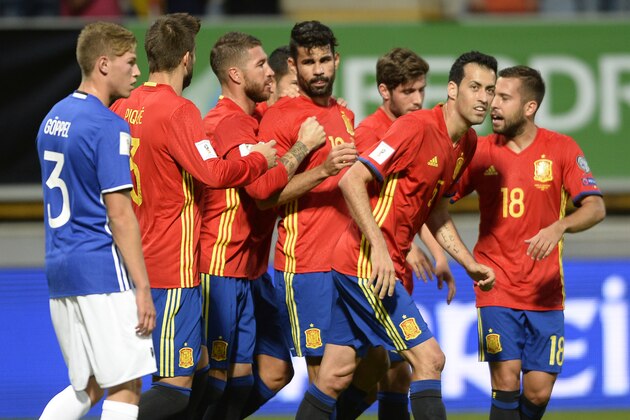 Spain's forward Diego Costa (C) celebrates with teammates after scoring a goal during the WC 2018 football qualification match between Spain and Liechtenstein at the Reyno de Leon Stadium in Leon on September 5, 2016. / AFP / MIGUEL RIOPA        (Photo credit should read MIGUEL RIOPA/AFP/Getty Images)