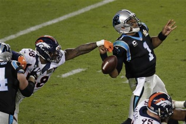 FILE - In this Feb. 7, 2016, file photo, Denver Broncos' Von Miller (58) strips the ball from Carolina Panthers' Cam Newton (1) during the second half of the NFL Super Bowl 50 football game in Santa Clara, Calif. Miller has agreed to a blockbuster $114.5 million contract with the Denver Broncos that includes $70 million in guarantees and makes him the highest-paid nonquarterback in NFL history. The Super Bowl MVP accepted the six-year offer two hours before Friday's, July 15, 2016 deadline, tweeting a photo of himself with the caption
