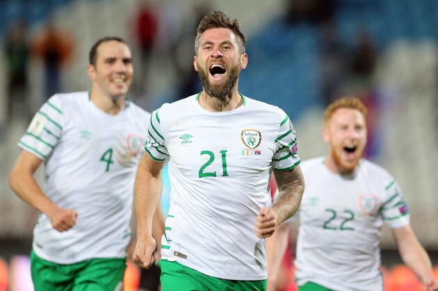 Ireland's Daryl Murphy (C) celebrates scoring with teammates John OShea (L) and Stephen Quinn during the World Cup 2018 qualifying football match between Serbia and Ireland in Belgrade on September 5, 2016.  / AFP / Pedja MILOSAVLJEVIC        (Photo credit should read PEDJA MILOSAVLJEVIC/AFP/Getty Images)