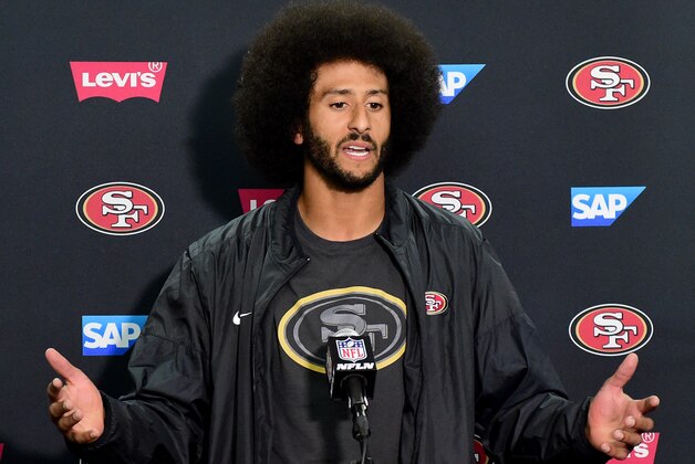 SAN DIEGO, CA - SEPTEMBER 01:  Colin Kaepernick #7 of the San Francisco 49ers speaks to media during a press conference after a 31-21 preseason win over the San Diego Chargers at Qualcomm Stadium on September 1, 2016 in San Diego, California.  (Photo by Harry How/Getty Images)