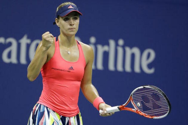 Angelique Kerber, of Germany, celebrates after defeating Petra Kvitova, of the Czech Republic, during the fourth round of the U.S. Open tennis tournament, Sunday, Sept. 4, 2016, in New York. (AP Photo/Darron Cummings)