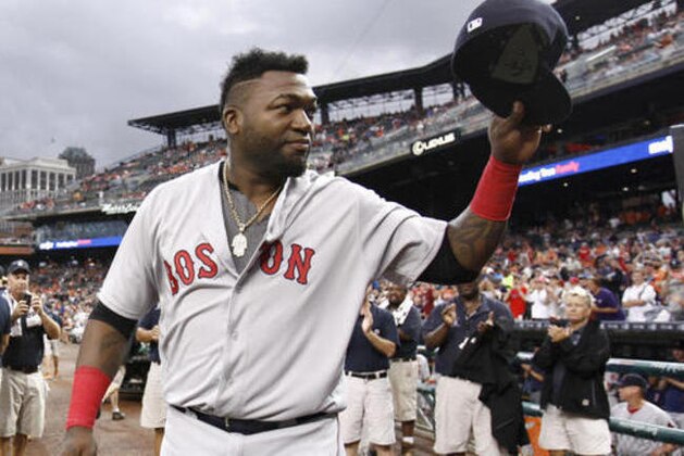 Boston Red Sox's David Ortiz acknowledges fans at Comerica Park as he is honored by the Detroit Tigers before a baseball game Saturday, Aug. 20, 2016, in Detroit. Ortiz has announced his retirement following this season. (AP Photo/Duane Burleson)
