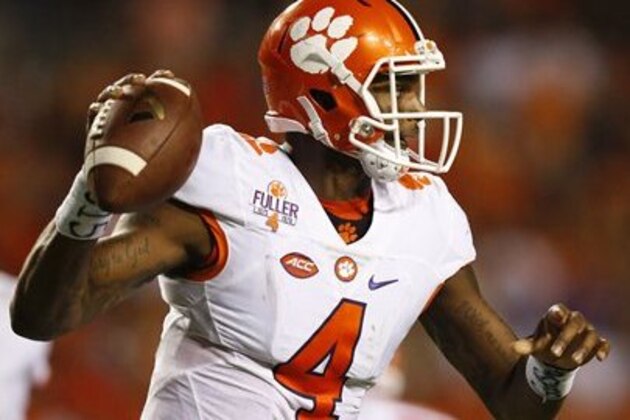 Clemson quarterback Deshaun Watson sets back to pass during the second half of an NCAA college football game, Saturday, Sept. 3, 2016, in Auburn, Ala. (AP Photo/Brynn Anderson)