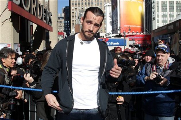 WWE Superstar CM Punk poses at Madison Square Garden, Friday, Nov. 18, 2011, in New York, during a rally leading up to the 25th Anniversary of Survivor Series, taking place Sunday at Madison Square Garden.  The event will feature actor and wrestling favorite Dwayne