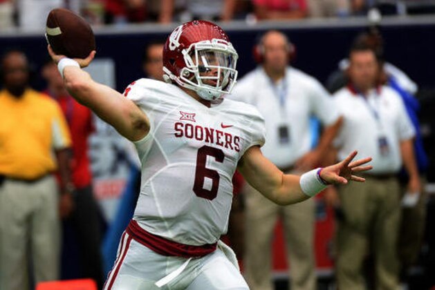 Oklahoma quarterback Baker Mayfield passes against the Houston Cougars in the first half of an NCAA college football game Saturday, Sept. 3, 2016, in Houston. (AP Photo/George Bridges)