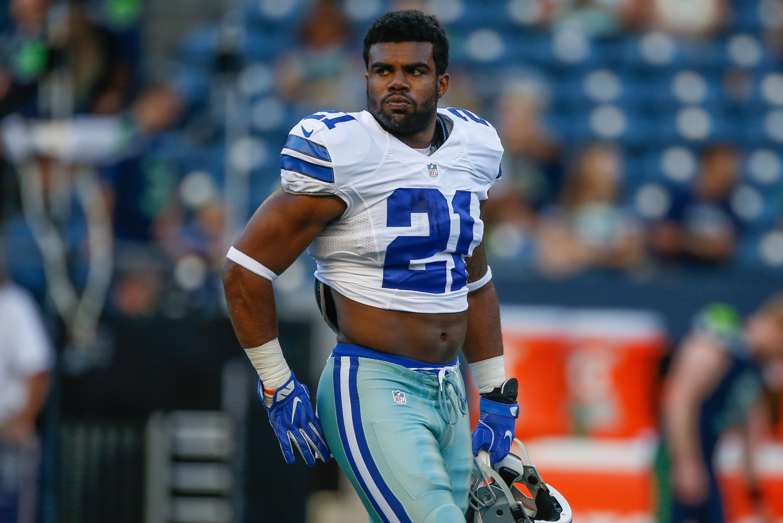 SEATTLE, WA - AUGUST 25:  Running back Ezekiel Elliott #21 of the Dallas Cowboys looks on prior to the preseason game against the Seattle Seahawks at CenturyLink Field on August 25, 2016 in Seattle, Washington.  (Photo by Otto Greule Jr/Getty Images)