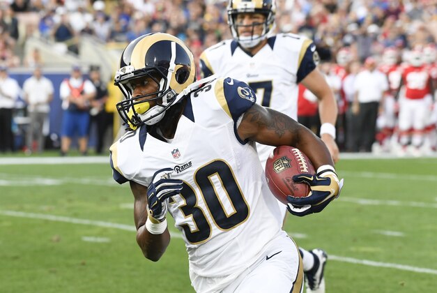 Aug 20, 2016; Los Angeles, CA, USA; Los Angeles Rams running back Todd Gurley (30) runs the ball during the first quarter against the Kansas City Chiefs at Los Angeles Memorial Coliseum. Mandatory Credit: Richard Mackson-USA TODAY Sports