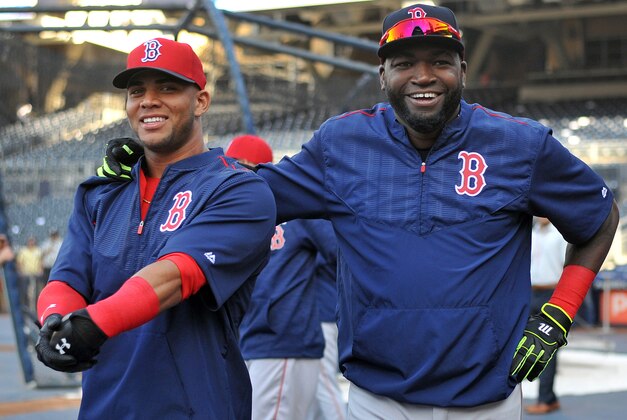 Sep 6, 2016; San Diego, CA, USA; Boston Red Sox designated hitter David Ortiz (R) smiles before the game with third baseman Yoan Moncada (65) against the San Diego Padres at Petco Park. Mandatory Credit: Jake Roth-USA TODAY Sports