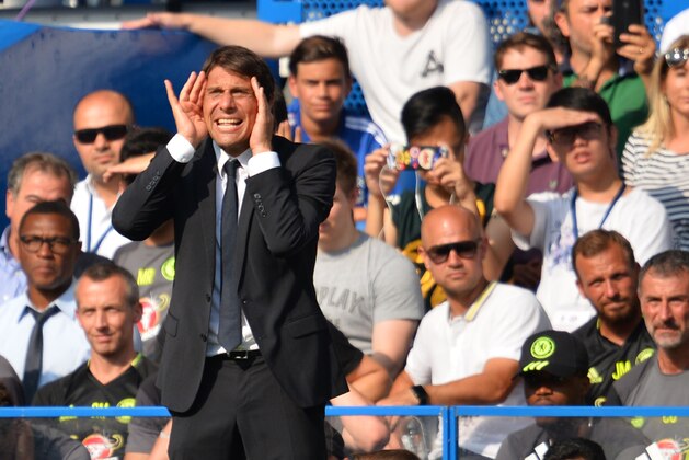 Chelsea's Italian head coach Antonio Conte shouts at his players during the English Premier League football match between Chelsea and Burnley at Stamford Bridge in London on August 27, 2016. / AFP / GLYN KIRK / RESTRICTED TO EDITORIAL USE. No use with unauthorized audio, video, data, fixture lists, club/league logos or 'live' services. Online in-match use limited to 75 images, no video emulation. No use in betting, games or single club/league/player publications.  /         (Photo credit should read GLYN KIRK/AFP/Getty Images)