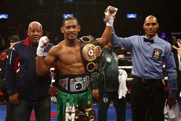 Daniel Jacobs celebrates his victory over Peter Quillin with a first round knockout in a WBA middleweight championship boxing bout in New York on Saturday, Dec. 5, 2015. Jacobs won by a knockout in the first round. (AP Photo/Rich Schultz)