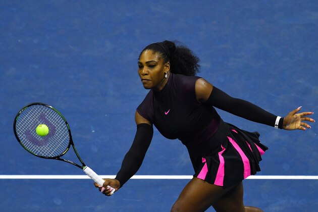 Serena Williams of United States hits a return against Simona Halep of Romania during their 2016 US Open Women's Singles match at the USTA Billie Jean King National Tennis Center in New York on September 7, 2016. / AFP / EDUARDO MUNOZ ALVAREZ        (Photo credit should read EDUARDO MUNOZ ALVAREZ/AFP/Getty Images)