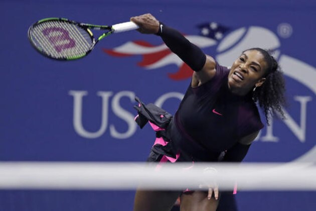 Serena Williams, of the United States, serves to Simona Halep, of Romania, during quarterfinal match at the U.S. Open tennis tournament, Wednesday, Sept. 7, 2016, in New York. (AP Photo/Charles Krupa)
