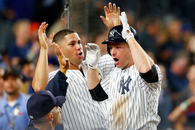 NEW YORK, NY - SEPTEMBER 06:  Chase Headley #12 of the New York Yankees celebrates his eighth-inning, two-run home run against the Toronto Blue Jays with teammate Gary Sanchez #24 at Yankee Stadium on September 6, 2016 in the Bronx borough of New York City.  (Photo by Jim McIsaac/Getty Images)