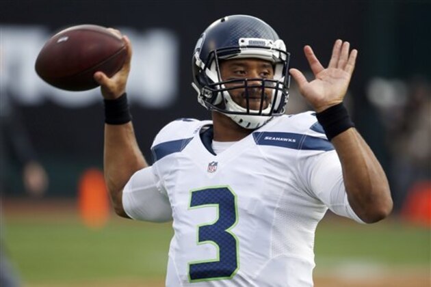Seattle Seahawks quarterback Russell Wilson (3) warms up before a preseason NFL football game against the Oakland Raiders Thursday, Sept. 1, 2016, in Oakland, Calif. (AP Photo/Tony Avelar)