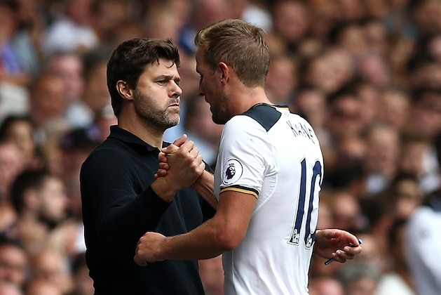 LONDON, ENGLAND - AUGUST 27:  Mauricio Pochettino, Manager of Tottenham Hotspur shakes hands with Harry Kane after a substitution during the Premier League match between Tottenham Hotspur and Liverpool at White Hart Lane on August 27, 2016 in London, England.  (Photo by Jan Kruger/Getty Images)