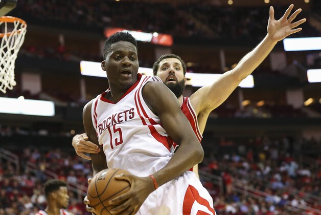 Mar 31, 2016; Houston, TX, USA; Houston Rockets forward Clint Capela (15) and Chicago Bulls forward Nikola Mirotic (44) battle for a loose ball during the second quarter at Toyota Center. Mandatory Credit: Troy Taormina-USA TODAY Sports