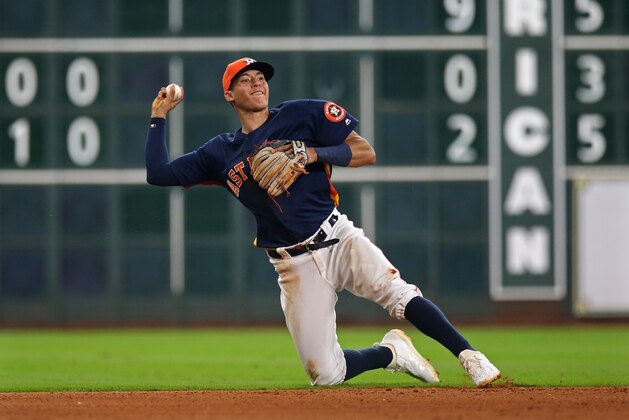 HOUSTON, TX - AUGUST 28:  Carlos Correa #1 of the Houston Astros makes a play at shortstop against the Tampa Bay Rays during the game at Minute Maid Park on Sunday, August 28, 2016 in Houston, Texas. (Photo by Brad Mangin/MLB Photos via Getty Images)