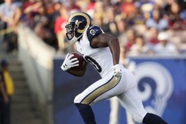 Los Angeles Rams running back Todd Gurley runs the football during the first half of a preseason NFL football game against the Kansas City Chiefs, Saturday, Aug. 20, 2016, in Los Angeles. (AP Photo/Ryan Kang)