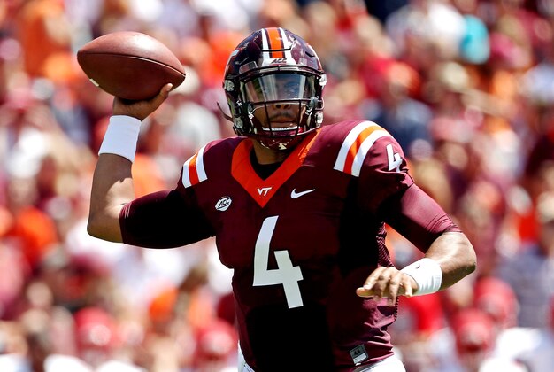 Sep 3, 2016; Blacksburg, VA, USA; Virginia Tech Hokies quarterback Jerod Evans (4) throws a pass during the first quarter against the Liberty Flames at Lane Stadium. Mandatory Credit: Peter Casey-USA TODAY Sports