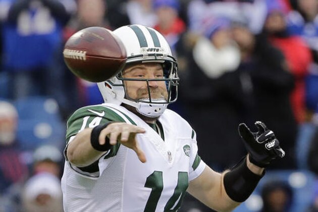FILE - In this Jan. 3, 2016, file photo, New York Jets quarterback Ryan Fitzpatrick (14) throws a pass during the first half of an NFL football game against the Buffalo Bills in Orchard Park, N.Y. A lot of the Jets' success will fall on his shoulders. With a defense again expected to be among the NFL's best, New York needs Fitzpatrick to at least approach last season’s career-type year.  (AP Photo/Bill Wippert, File)