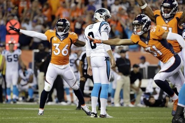 CORRECT THAT LEE WAS HOLDER, INSTEAD OF KICKER - Denver Broncos cornerback Kayvon Webster (36) celebrates a Carolina Panthers missed field goal as holder Andy Lee (8) looks away during the second half of an NFL football game, Thursday, Sept. 8, 2016, in Denver. The Broncos won 21-20. (AP Photo/Jack Dempsey)
