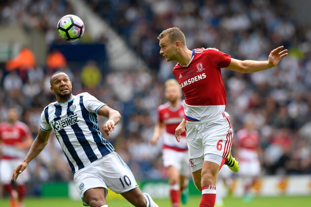 WEST BROMWICH, ENGLAND - AUGUST 28:  Middlesbrough captain Ben Gibson (r) beats Matt Phillips to the ball during the Premier League match between West Bromwich Albion and Middlesbrough at The Hawthorns on August 28, 2016 in West Bromwich, England.  (Photo by Stu Forster/Getty Images)