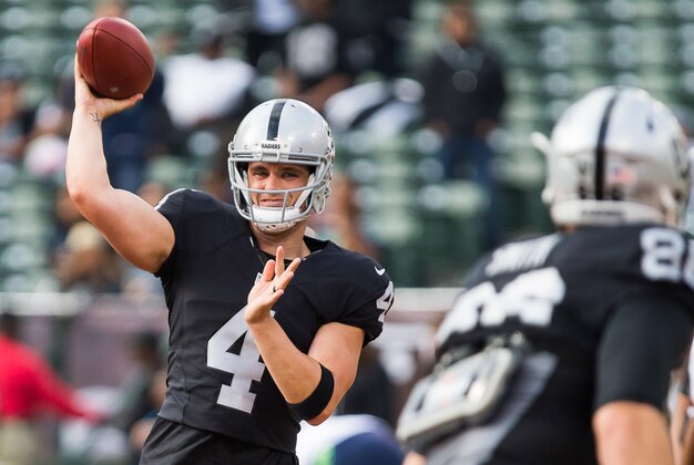 Sep 1, 2016; Oakland, CA, USA; Oakland Raiders quarterback Derek Carr (4) throws the before the game Seattle Seahawks at Oakland Coliseum. Mandatory Credit: Kelley L Cox-USA TODAY Sports