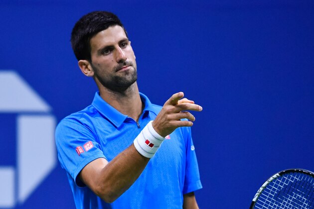 Novak Djokovic of Serbia reacts after losing a point against Jo-Wilfried Tsonga of France during their 2016 US Open Men's Singles match at the USTA Billie Jean King National Tennis Center in New York on September 6, 2016. / AFP / EDUARDO MUNOZ ALVAREZ        (Photo credit should read EDUARDO MUNOZ ALVAREZ/AFP/Getty Images)