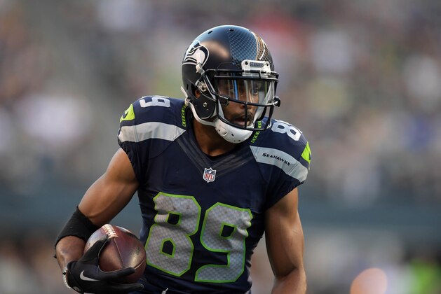 Aug 25, 2016; Seattle, WA, USA; Seattle Seahawks wide receiver Doug Baldwin (89) carries the ball against the Dallas Cowboys during a NFL football game at CenturyLink Field. The Seahawks defeated the Cowboys 27-17. Mandatory Credit: Kirby Lee-USA TODAY Sports