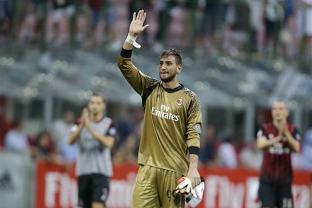 AC Milan goalkeeper Gianluigi Donnarumma waves fans at the end of the Serie A soccer matchduring the Serie A soccer match between AC Milan and Torino at the San Siro stadium in Milan, Italy, Sunday, Aug. 21, 2016. (AP Photo/Antonio Calanni)