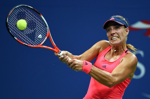Angelique Kerber of Germany hits a return against Caroline Wozniacki of Denmark during their 2016 US Open Womens Singles semifinal match at the USTA Billie Jean King National Tennis Center in New York on September 8, 2016. / AFP / Timothy A. CLARY        (Photo credit should read TIMOTHY A. CLARY/AFP/Getty Images)