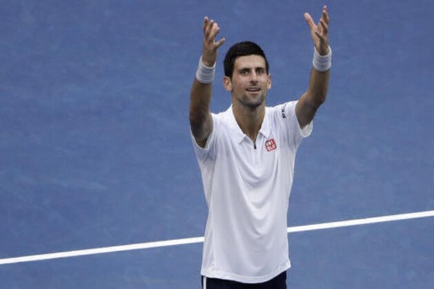 Novak Djokovic, of Serbia, reacts after defeating Gael Monfils, of France, during the semifinals of the U.S. Open tennis tournament, Friday, Sept. 9, 2016, in New York. (AP Photo/Seth Wenig)