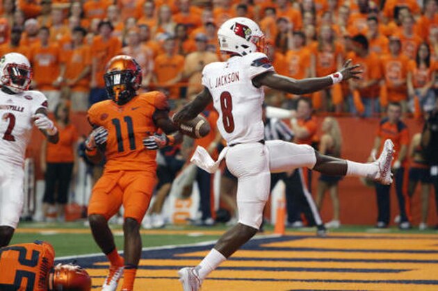 Louisville's Lamar Jackson high-steps into the end zone for a touchdown in the first quarter of an NCAA college football game against Syracuse in Syracuse, N.Y., Friday, Sept. 9, 2016. (AP Photo/Nick Lisi)