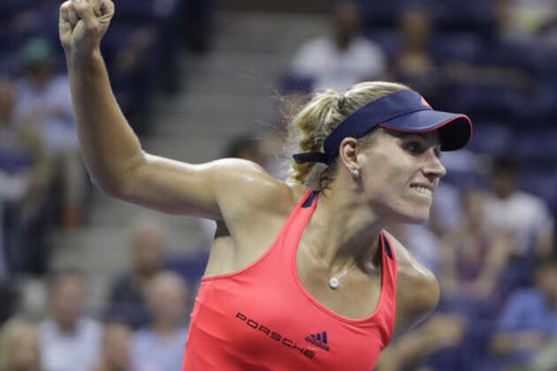 Angelique Kerber, of Germany, reacts after defeating Caroline Wozniacki, of Denmark, during the semifinals of the U.S. Open tennis tournament, Thursday, Sept. 8, 2016, in New York. (AP Photo/Darron Cummings)