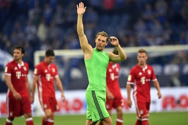 Bayern goalkeeper Manuel Neuer waves to Schalke fans after the German Bundesliga soccer match between FC Schalke 04 and Bayern Munich in Gelsenkirchen, Germany, Friday, Sept. 9, 2016. (AP Photo/Martin Meissner)