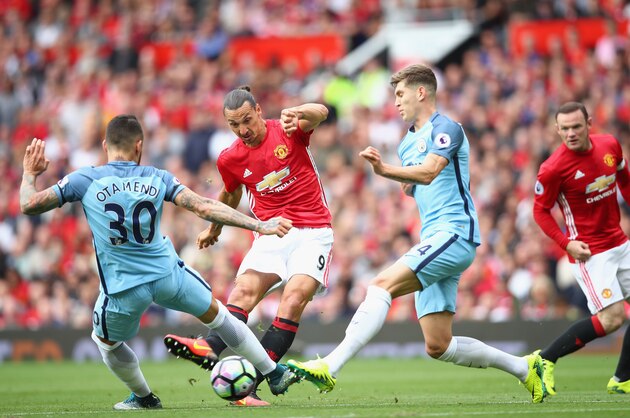 MANCHESTER, ENGLAND - SEPTEMBER 10:  Zlatan Ibrahimovic of Manchester United shoots during the Premier League match between Manchester United and Manchester City at Old Trafford on September 10, 2016 in Manchester, England.  (Photo by Clive Brunskill/Getty Images)