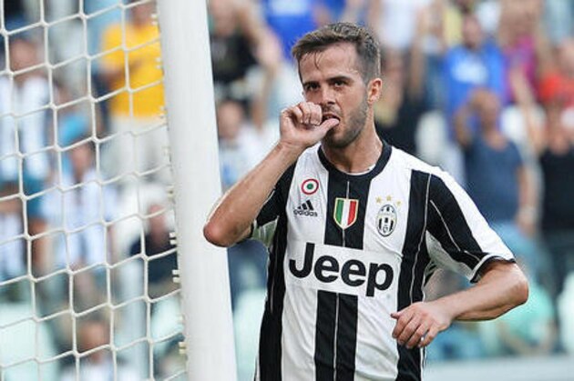 Juventus' Miralem Pjanic celebrates after scoring during a Serie A soccer match between Juventus and Sassuolo at the Juventus Stadium in Turin, Italy, Saturday, Sept. 10, 2016. (Alessandro Di Marco/ANSA via AP)