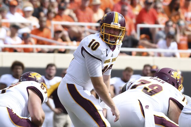 STILL WATER, OK - SEPTEMBER 10:  Quarterback Cooper Rush #10 of the Central Michigan Chippewas runs plays against Oklahoma State during the first half of a NCAA football game, September 10, 2016 at Boone Pickens Stadium in Stillwater, Oklahoma. (Photo by J Pat Carter/Getty Images)